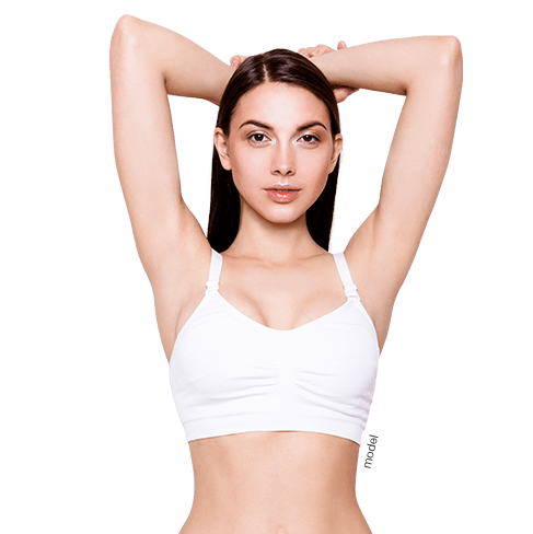 Breast lift procedure. Beautiful woman with arms above head.