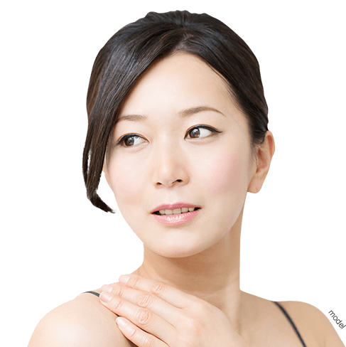 Facial Fat Grafting Procedure Beautiful woman looking off with hand to shoulder.